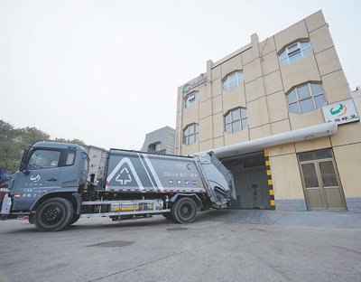 
上海第十人民医院黄牛代挂号电话票贩子号贩子网上预约挂号,住院检查加快,跟访清运车的一天（产经观察·构建现代化基础设施体系③）