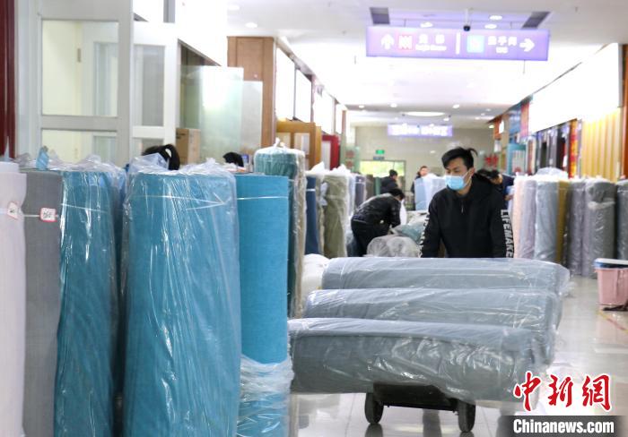 
北大第一医院黄牛代挂号电话票贩子号贩子网上预约挂号,住院检查加快,探访亚洲最大布匹市场：新春“热开场” 布商信心足