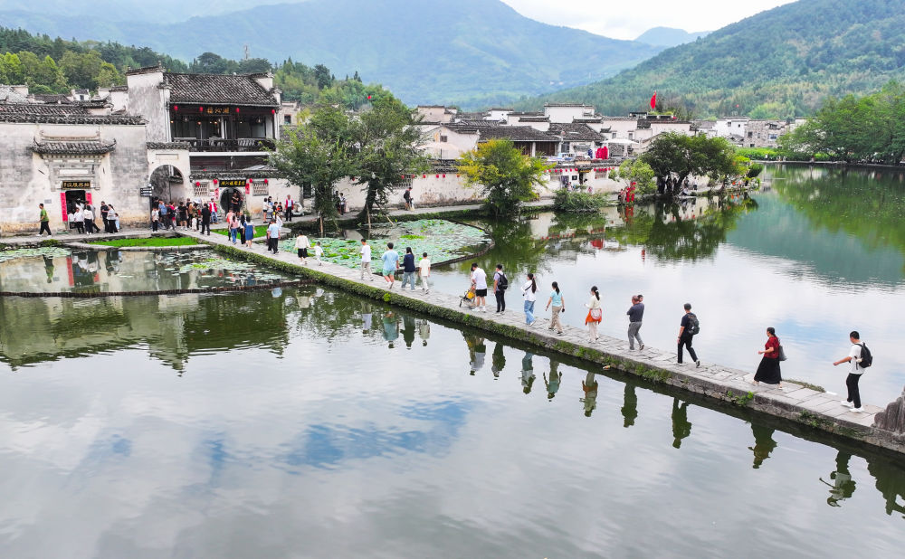 
广东省中医院黄牛代挂号电话票贩子号贩子网上预约挂号,住院检查加快,新华社出图｜每一张照片，都是对家国最深情的告白