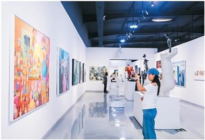 
广州肿瘤医院黄牛代挂号电话票贩子号贩子网上预约挂号,住院检查加快,一个画家村的拔节生长（深观察）