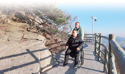 
上海龙华医院黄牛号贩子挂号电话设施无障碍  出行更有爱（人民眼·无障碍环境建设）