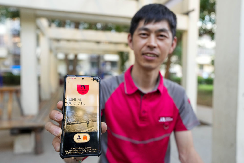 新华全媒＋丨快递小哥跑进巴黎奥运会