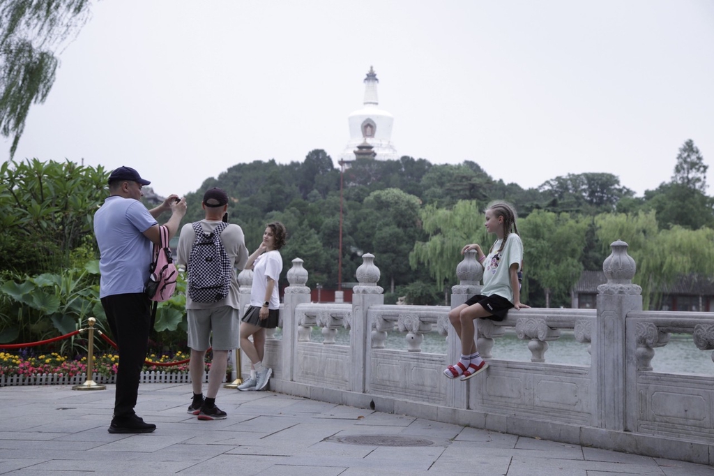 海外网评：打卡“中国行”走热，外国旅客乐享“中国游”