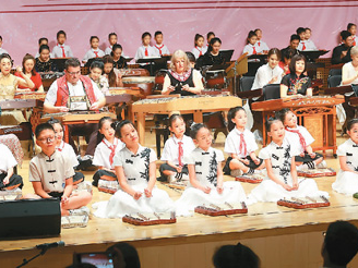 奏响文化交流悠悠琴声（共建文明百花园）