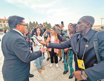 “中国全国两会向世界传递出信心与力量”（两会·读懂中国）